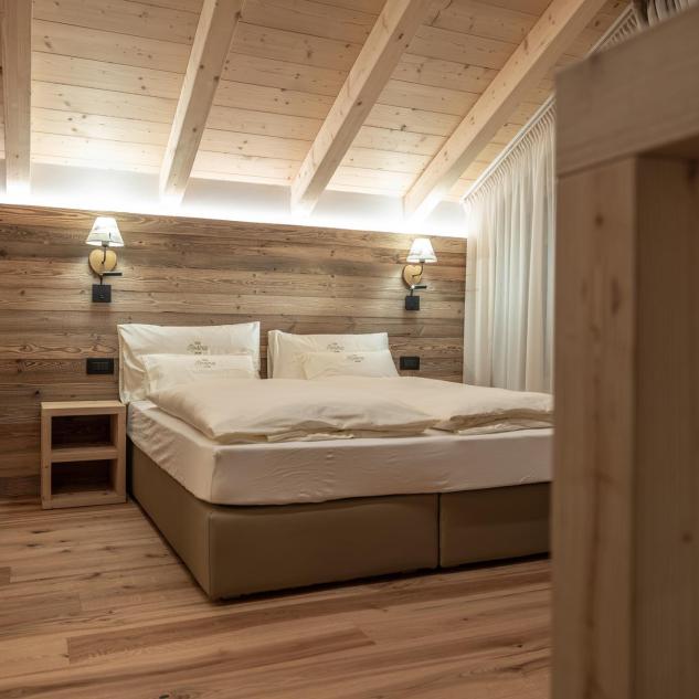 Schlafbereich mit Doppelbett - Ciasa Rosina